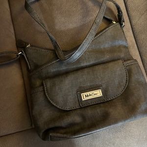 Multi Sak crossbody